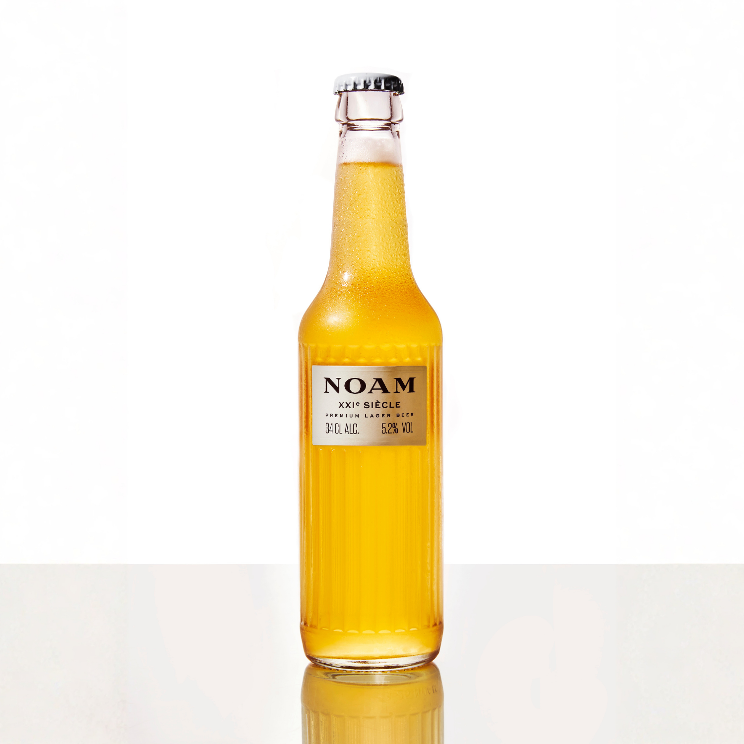 Bottle of NOAM beer on a white background