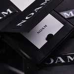 Image of the NOAM gift card from the top