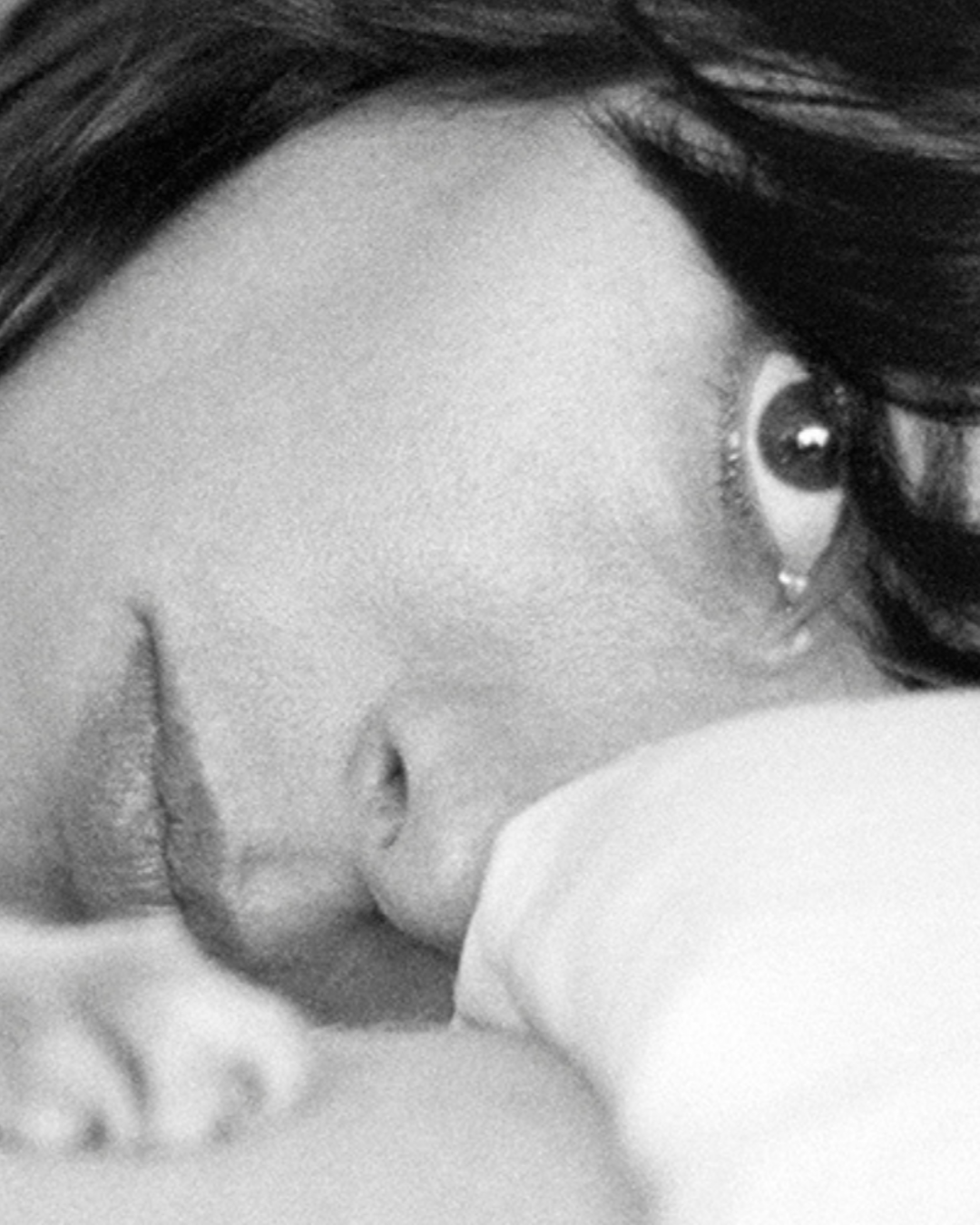 Close-up of a person's face with a soft focus on the eyes.